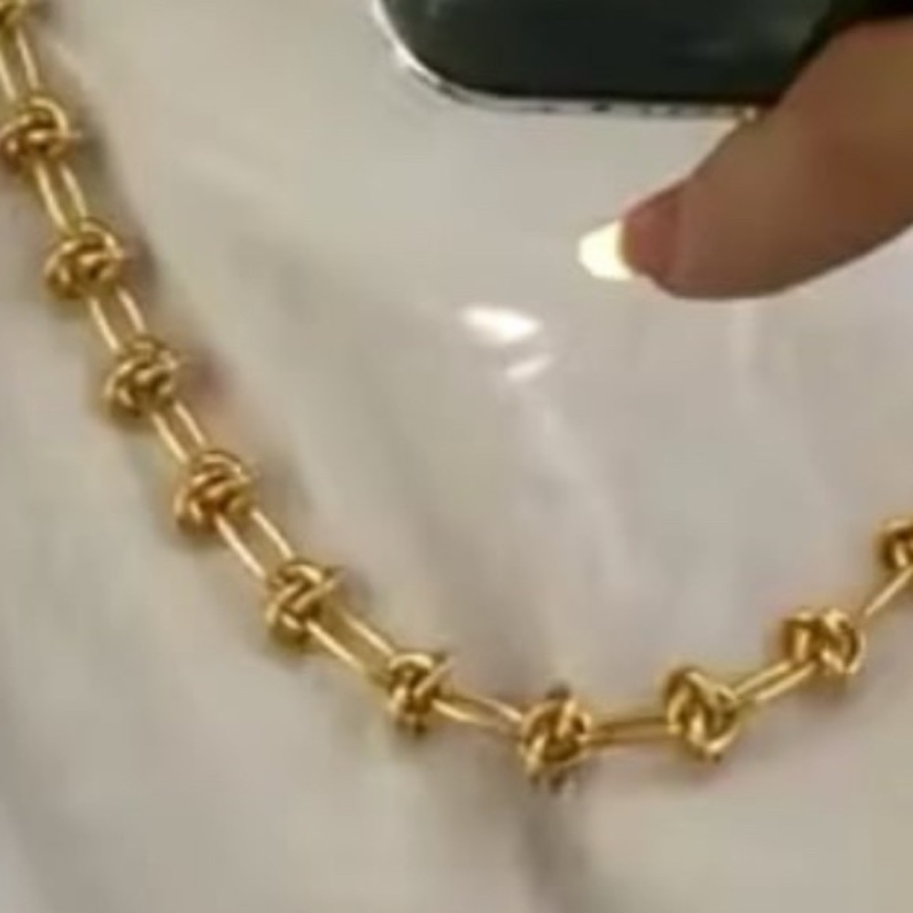 SOLD. Gold Knot Necklace